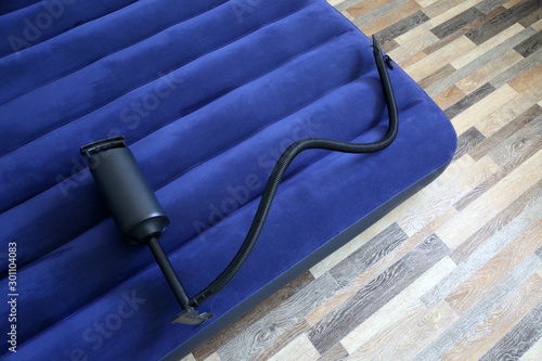 Bild auf Leinwand Air bed inflatable mattress and foot pumper good for sleep