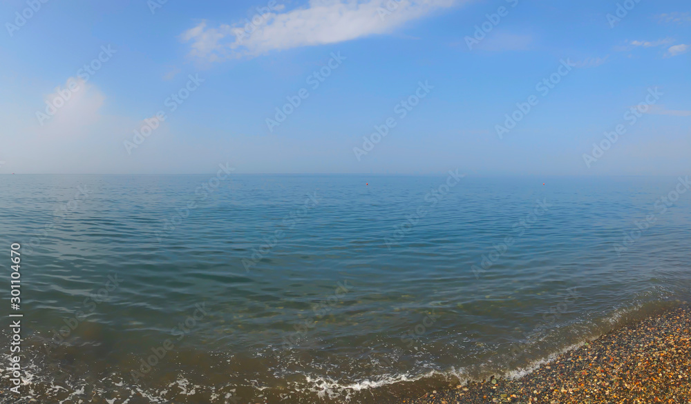 Panoramic view on beautiful sea. Summer sunny day, blue sky, water background