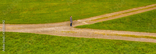 Woman at the crossroads.