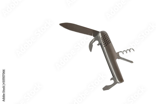 Multi-purpose knife placed on a white background.
