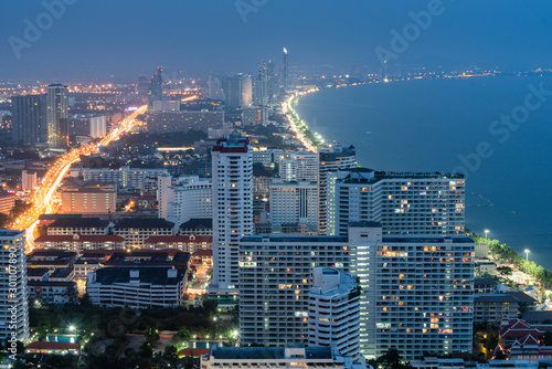 Pattaya City and Sea with suset  Thailand. Pattaya city skyline and pier at suset in Pattaya Chonburi Thailand