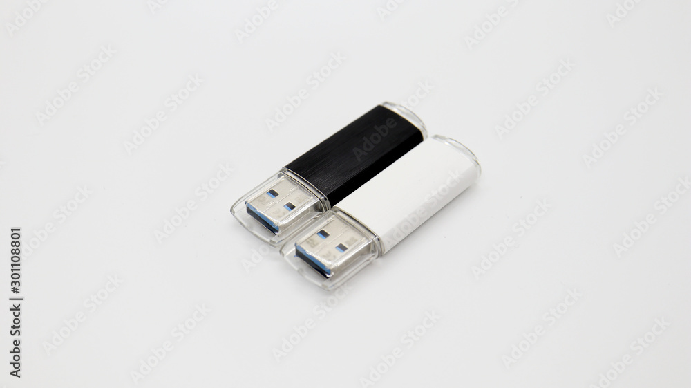 White and Black USB Memory on Isolated Background White and Black USB Memory on Isolated Background
