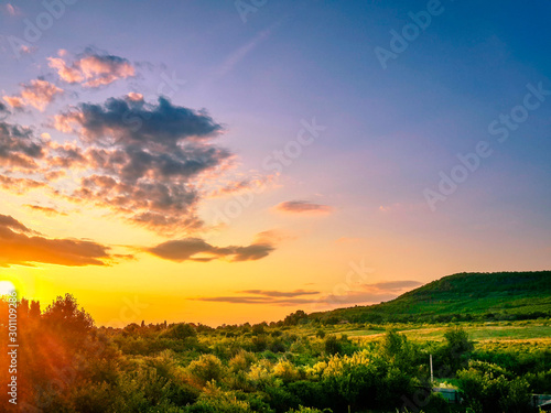 Beautiful Karpathian mountains and tender warm sunset sky photo