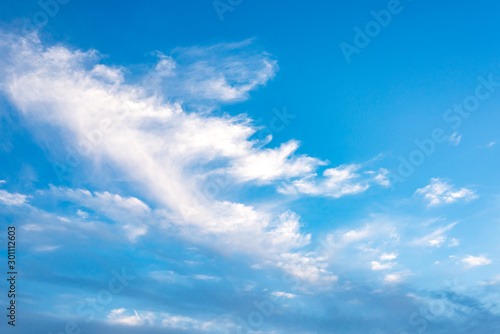 Evening sky with white clouds. Blue sky with white clouds.