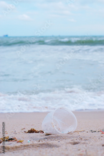 Plastic Pollutions and garbages on the beach, Rayong beach, Thailand © Araya