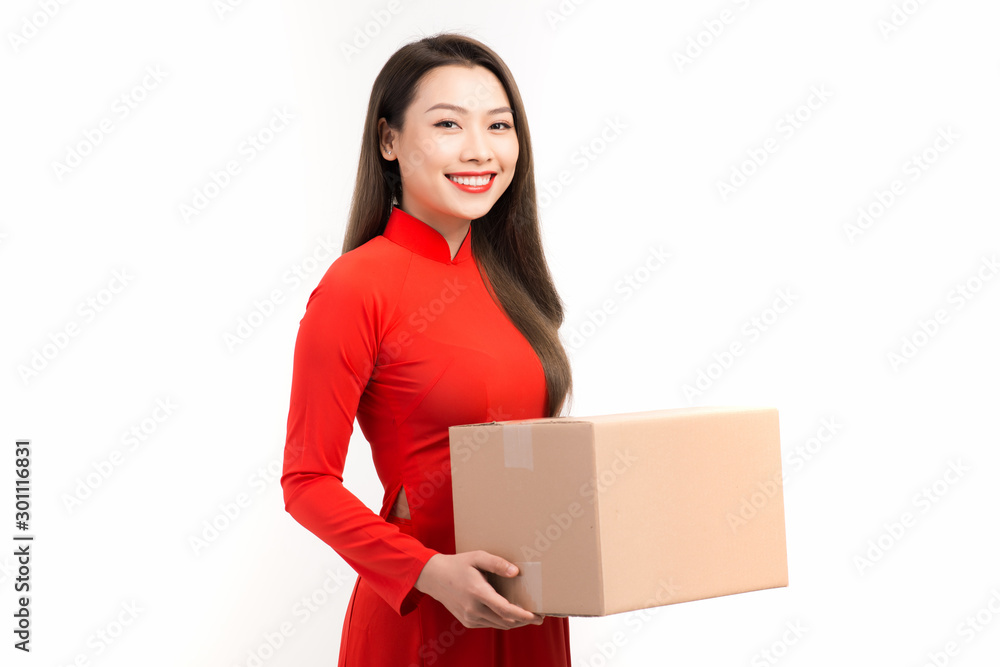 Happy chinese new year. Young woman holding gift box Happy chinese new year. Young woman holding gift box