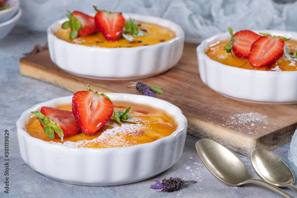 Creme brulee - traditional french vanilla cream dessert with caramelised sugar on top. Leite creme, portuguese desert. Creme brulee - traditional french vanilla cream dessert with caramelised sugar on top. Leite creme, portuguese desert.