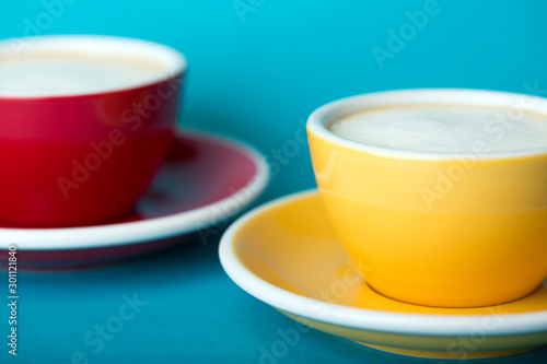 yellow and red cup on a blue background