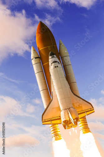 Fototapeta Naklejka Na Ścianę i Meble -  Flying rocket. Rocket launch. The elements of this image furnished by NASA.