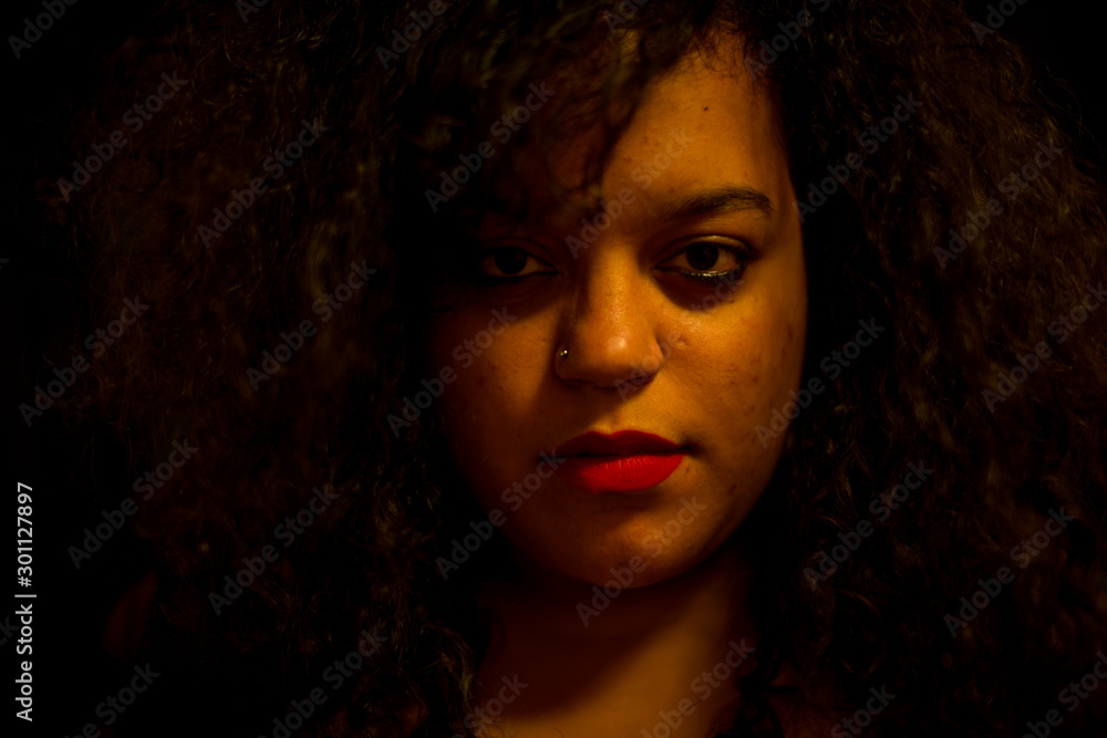 Portrait of woman with black background Portrait of woman with black background