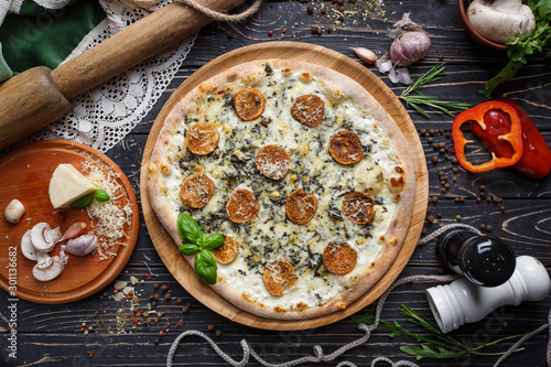Mushroom pizza with herbs and mozzarella. Mockup.