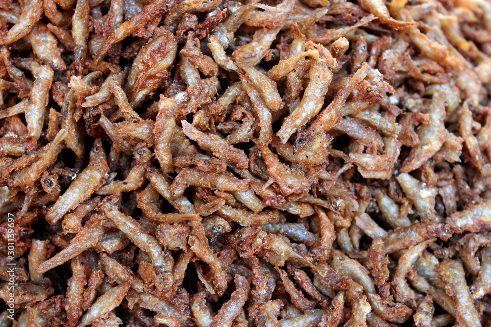 Crispy small fish placed on the stall for sale