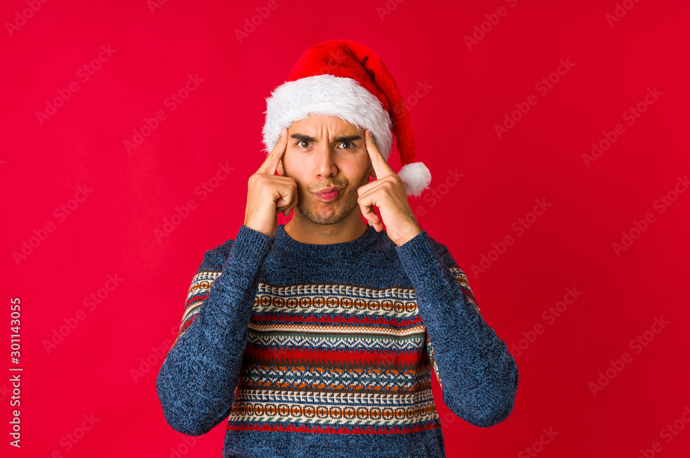 Young man on christmas day showing that she has no money. Young man on christmas day showing that she has no money.