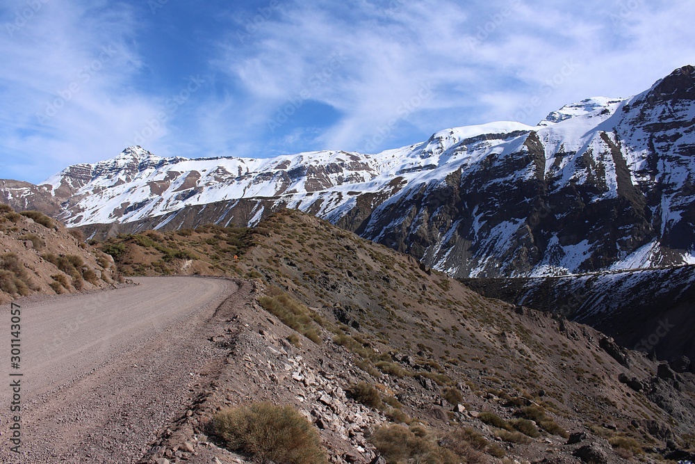 road among the mountains under a blue sky