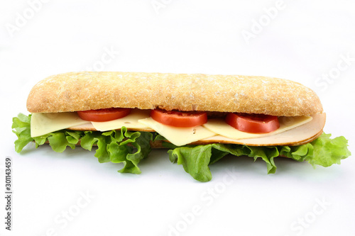 chicken sandwich, cheese and raw vegetables on a white background photo