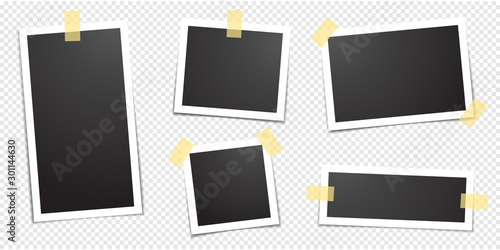 Polaroid photo frames fixed with adhesive tape on a transparent background. Photo frame on sticky tape, isolated.