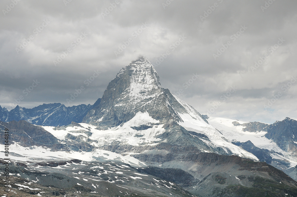 Dramatic cloudscape above Matterhorn mountain at day time. Switzerland.