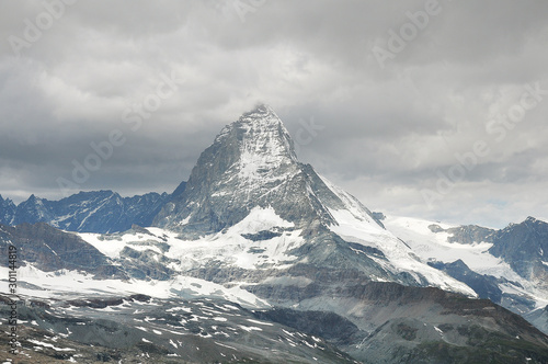 Dramatic cloudscape above Matterhorn mountain at day time. Switzerland. © serjiob74