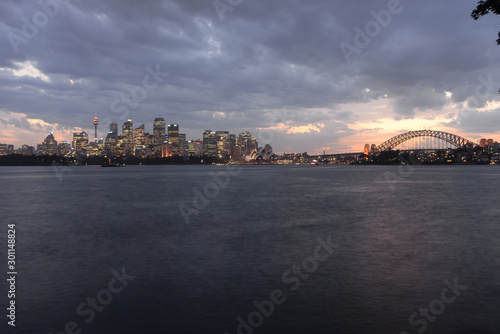 Sunset with Sydney city skyline lights