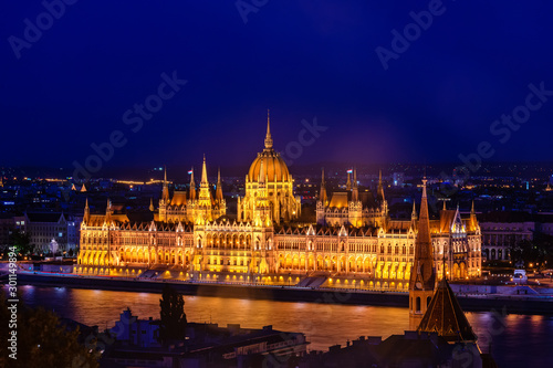Budapest, Hungary - October 01, 2019: Budapest Parliament at night. View of Hungarian Parliament Building, Royal Palace and Danube river.