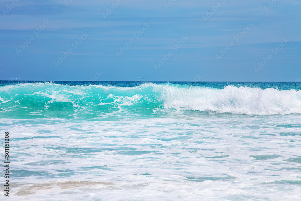Blue Sea Wave with White Foam and Sky