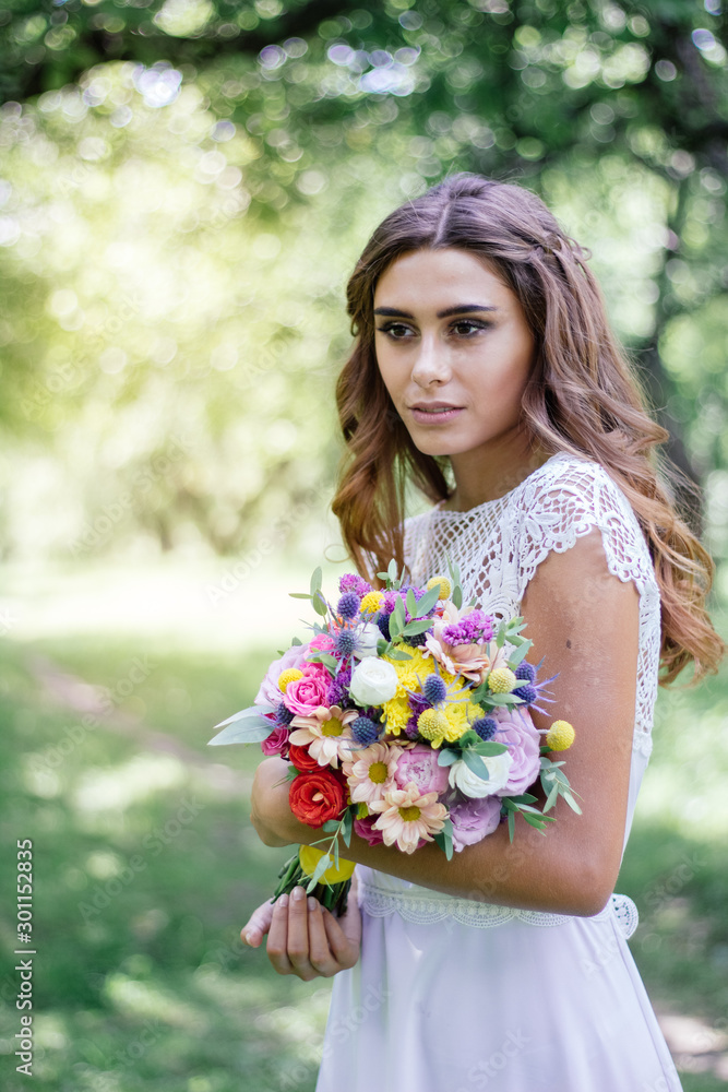 Wedding scene - bride with flower bouquet outdoor Wedding scene - bride with flower bouquet outdoor