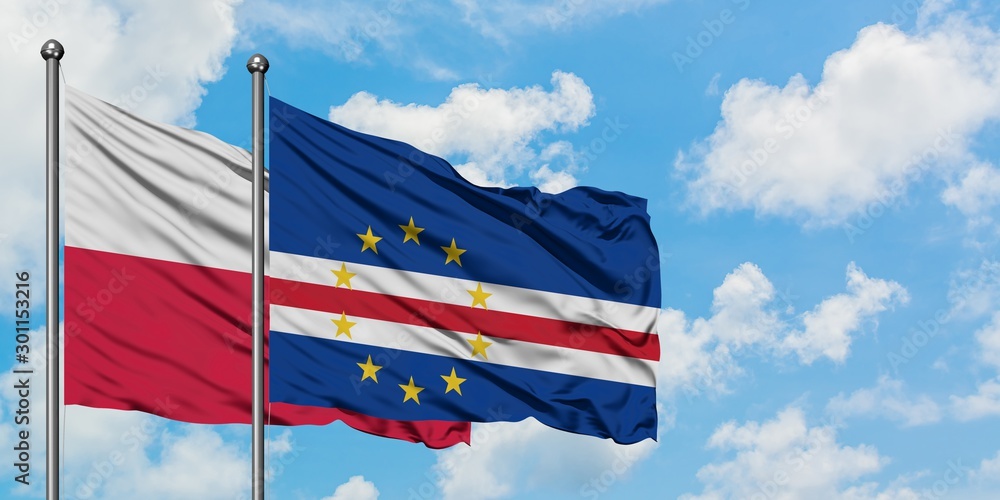 Poland and Cape Verde flag waving in the wind against white cloudy blue sky together. Diplomacy concept, international relations.
