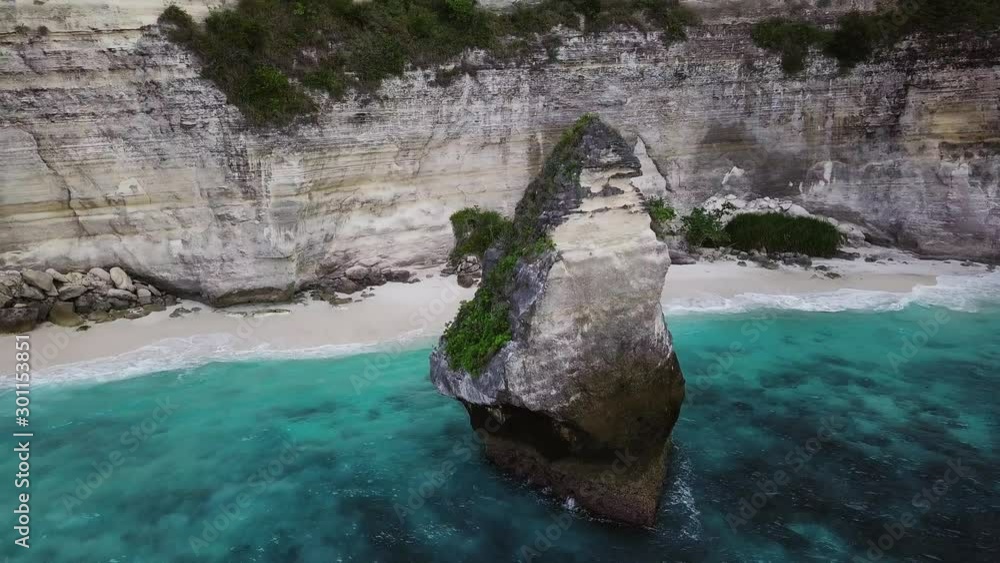 Aerial view of around rock in the ocean Aerial view of around rock in the ocean
