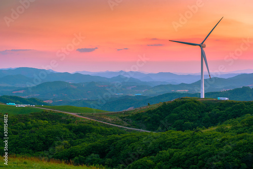 Sunrise The wind turbine field,seoul korea.