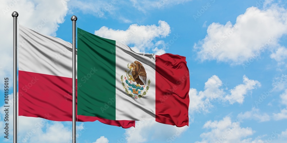 Poland and Mexico flag waving in the wind against white cloudy blue sky together. Diplomacy concept, international relations.
