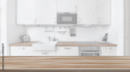 Wood table top on blur kitchen room background .Mockup counter for montage product display or design key visual layout