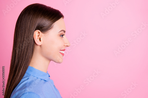 Profile photo of amazing business lady looking empty space glad to see colleagues after vacation wear blue dotted shirt isolated pink color background
