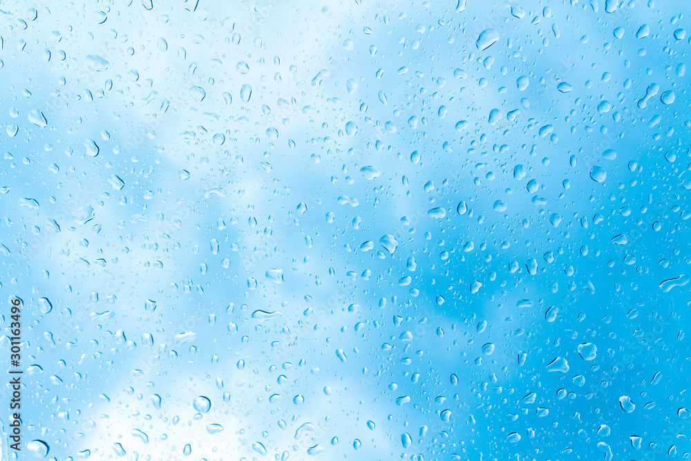 Water drops on glass or rain drop Water drops on glass or rain drop