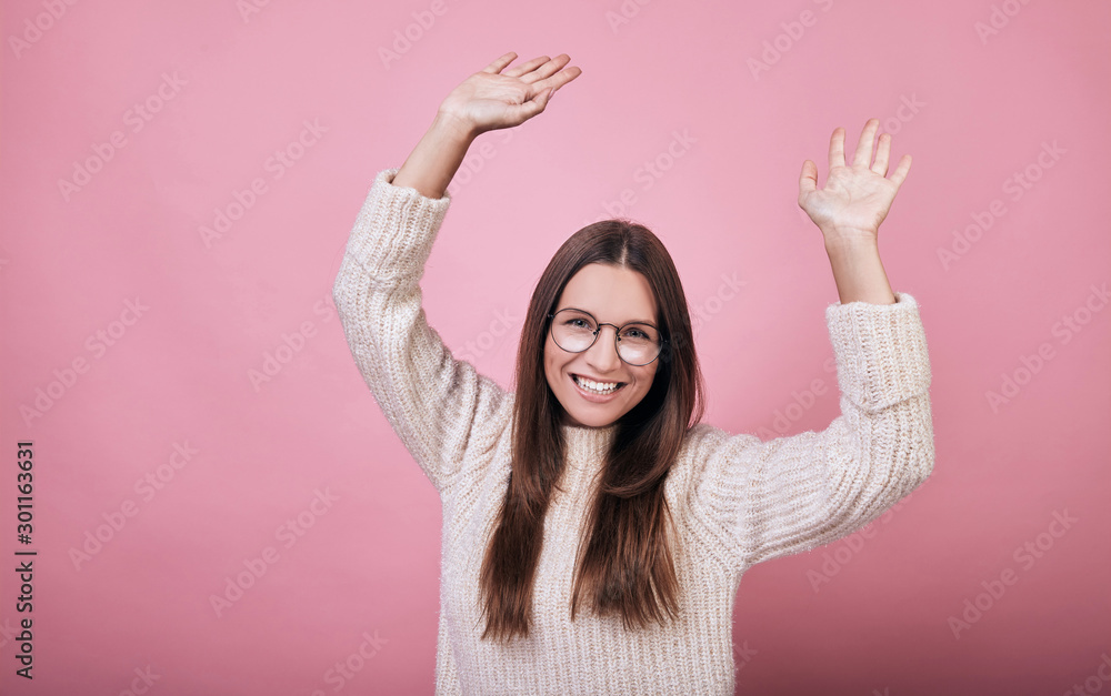 Nice funny girl in glasses and sweater dancing Nice funny girl in glasses and sweater dancing