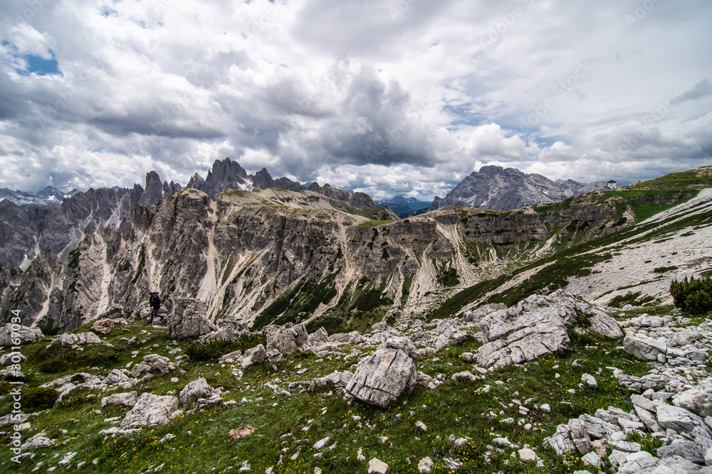 Dolomites, Italy - July, 2019: Amazing panoramic view from Tre Cime over the Dolomite's mountain