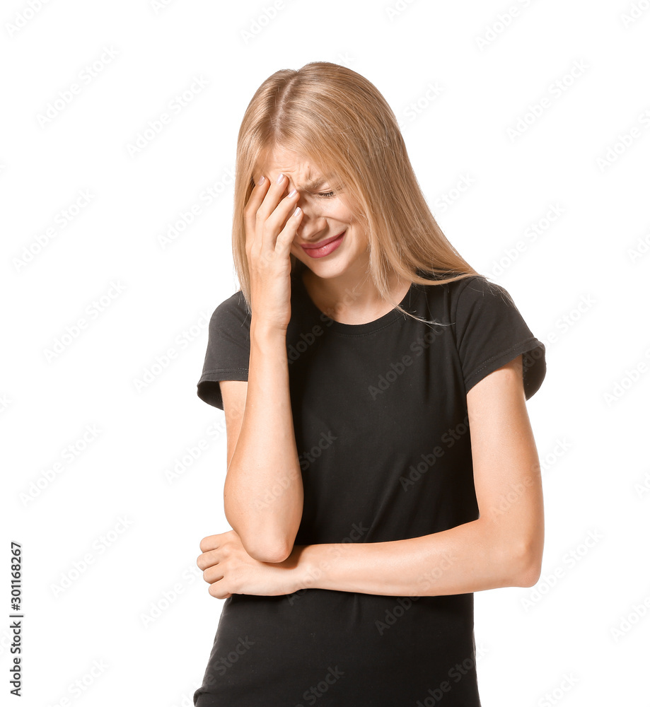 Stressed young woman on white background