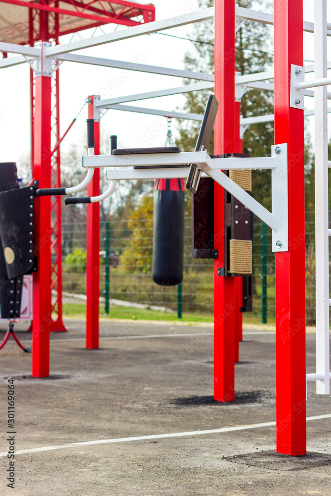 Healthy lifestyle concept. Colorful exercise machines on the street, which is being established as the new community health center. Healthy lifestyle concept. Colorful exercise machines on the street, which is being established as the new community health center.