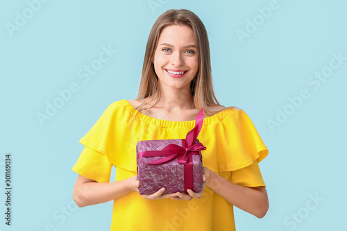 Beautiful woman with gift b...