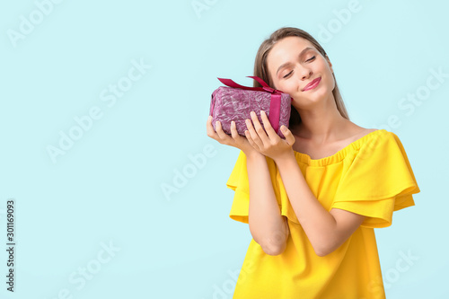 Beautiful woman with gift b...