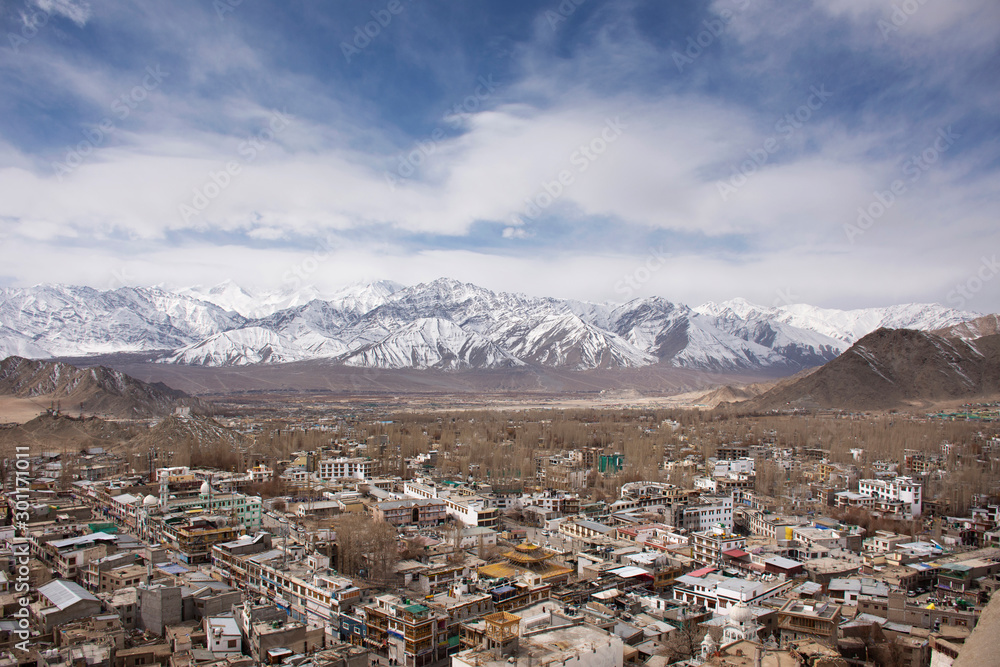 View landscape and cityscape of Leh Ladakh Village with Himalaya mountain range from viewpoint of Leh Stok Palace while winter season in Jammu and Kashmir, India