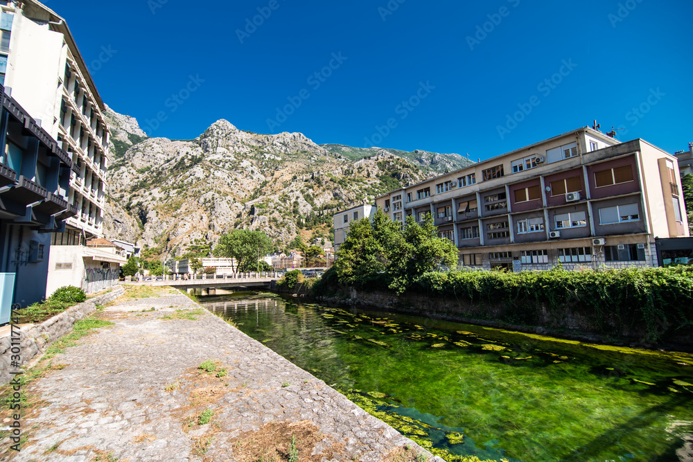 KOTOR, MONTENEGRO - JULY 2019: View on a small square in old town in Kotor, Montenegro. Kotor is town on coast of Montenegro and located on the Bay of Kotor