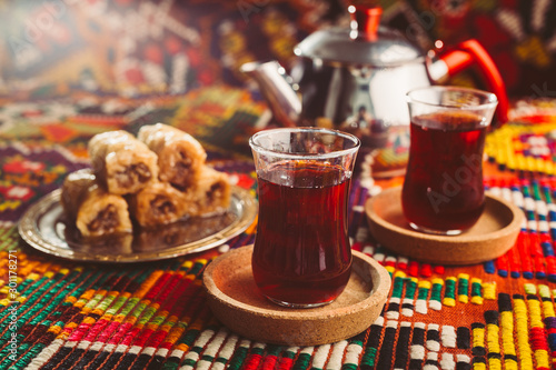 delicious turkish tea on colorful rug