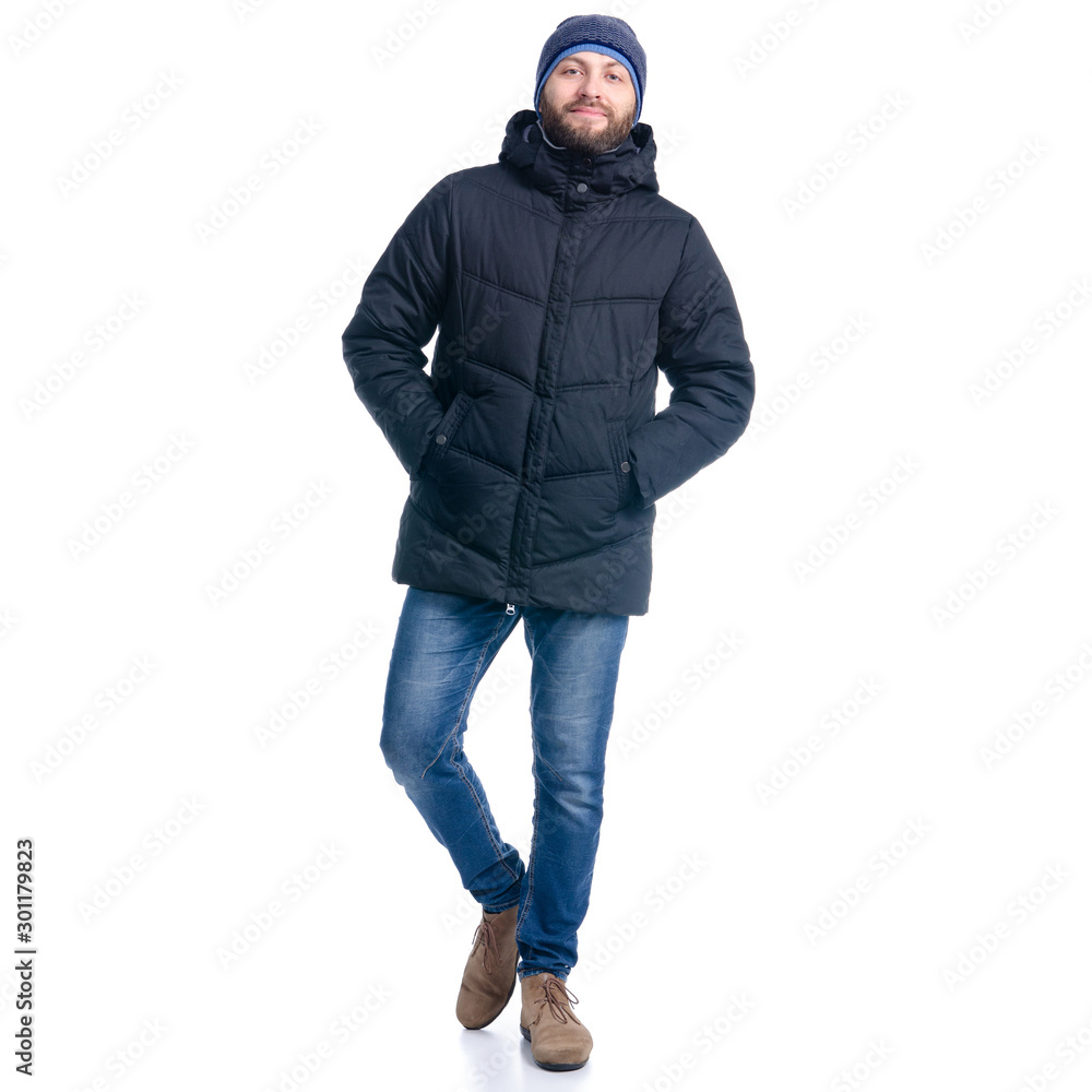 Man in winter jacket and warm hat walking goes Man in winter jacket and warm hat walking goes