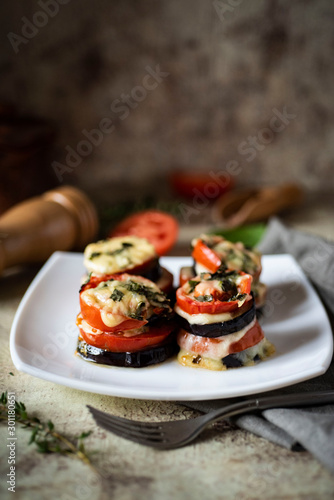 Delicious vegetarian dish: spicy eggplant Parmigiano with Basil