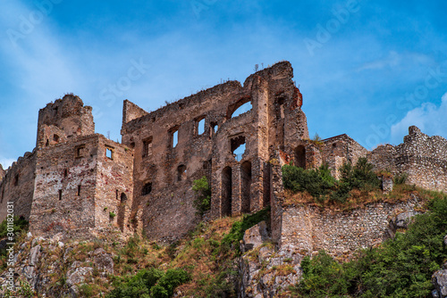 The ancient castle of Beckov. Slovak ancient ruins.Tematin castle ruins, Slovak republic, Europe. Travel destination.Backov Castle, village Beckov near Nove Mesto nad Vahom, Slovakia photo