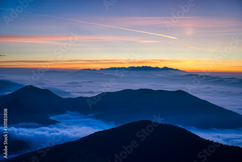 Fototapeta Naklejka Na Ścianę i Meble -  Mist flood the valley and mountains at the beautiful sunrise, slovakia, great rozutec