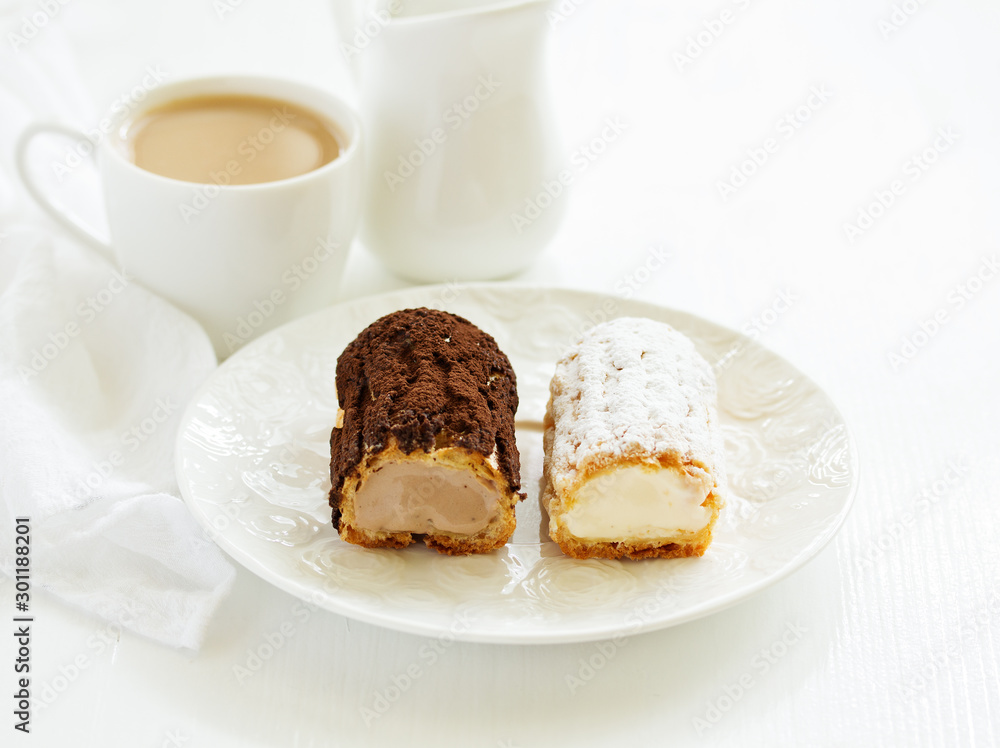 Sectional homemade eclairs, chocolate and vanilla. Sectional homemade eclairs, chocolate and vanilla.