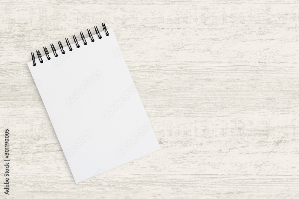 Top view for business background. Blank notebook for painting, drawing and sketching on wooden background. Top view for business background. Blank notebook for painting, drawing and sketching on wooden background.