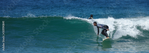 Canvas Print NB__9553 Young man surfing in Sagres
