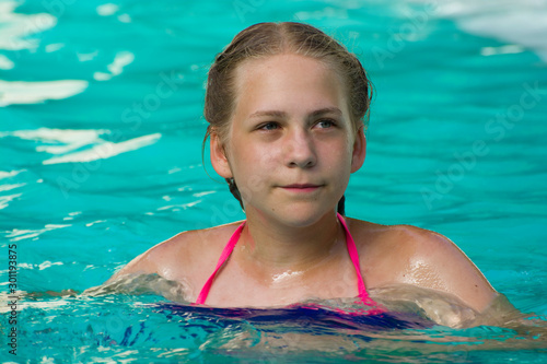 Teenage girl playing in lux...